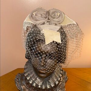 Elegant Cream Fascinator with Veil